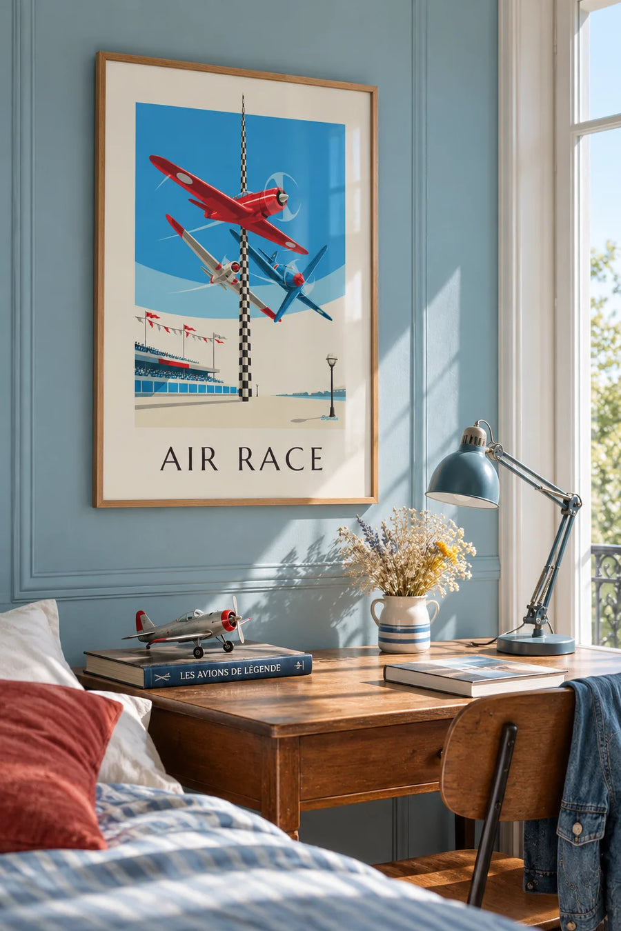 Poster of an air race around a pylon at the Grand Prix aérien: framed on the wall