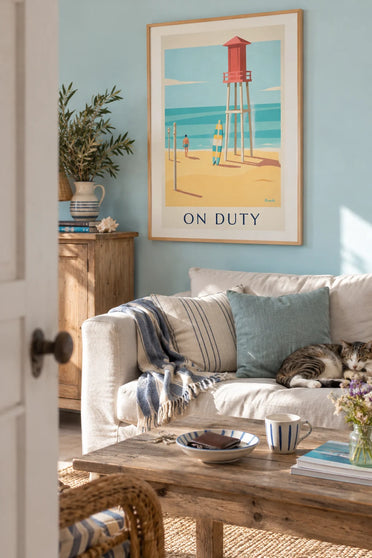 Surfboard and lifeguard tower on the beach poster: framed on the wall